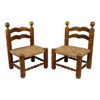 Pair of low straw chairs  circa 1940