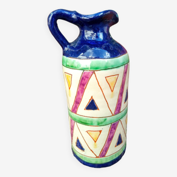 Vintage ceramic pitcher with geometric patterns