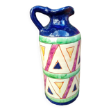 Vintage ceramic pitcher with geometric patterns