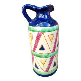 Vintage ceramic pitcher with geometric patterns