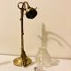 Brass table lamp with a glass shade