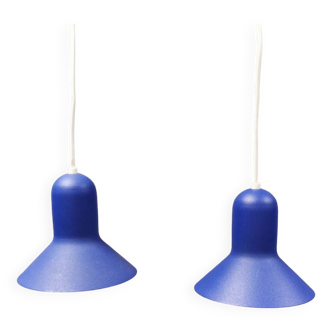 Two minimalist hanging lamps designed by Claus Bonderup and Torsten Thorup and produced by Nordlux