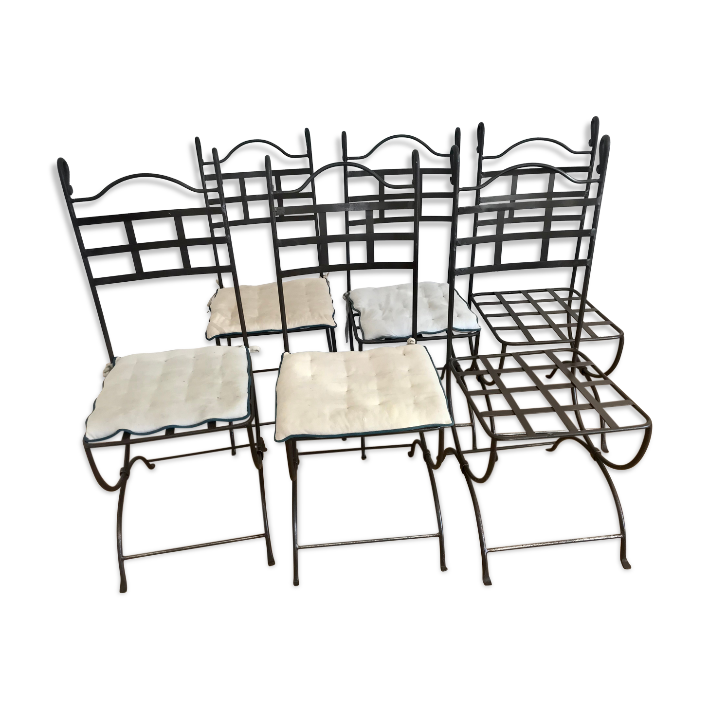 Six wrought iron chairs