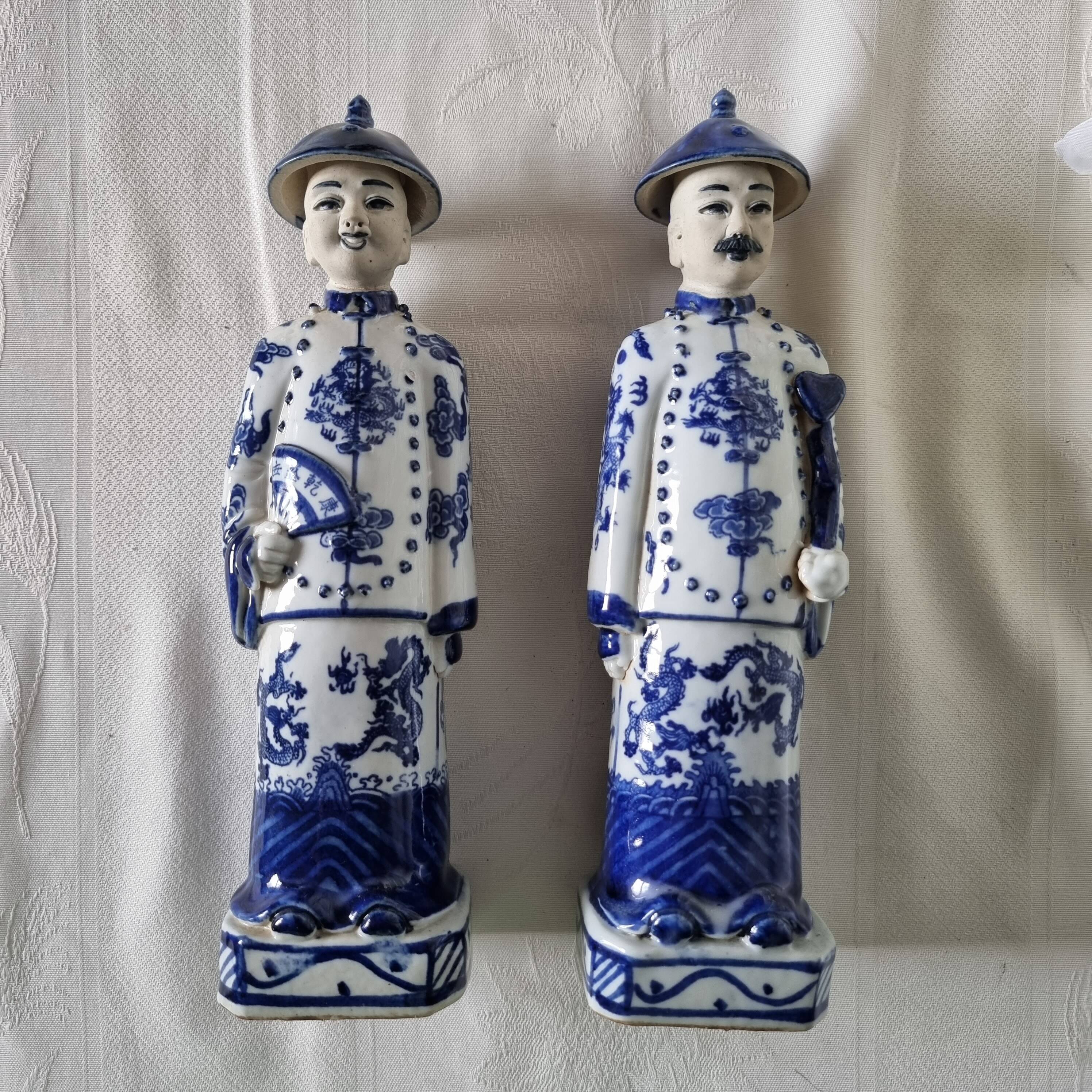 Pair of vintage Chinese blue and white porcelain figurines depicting