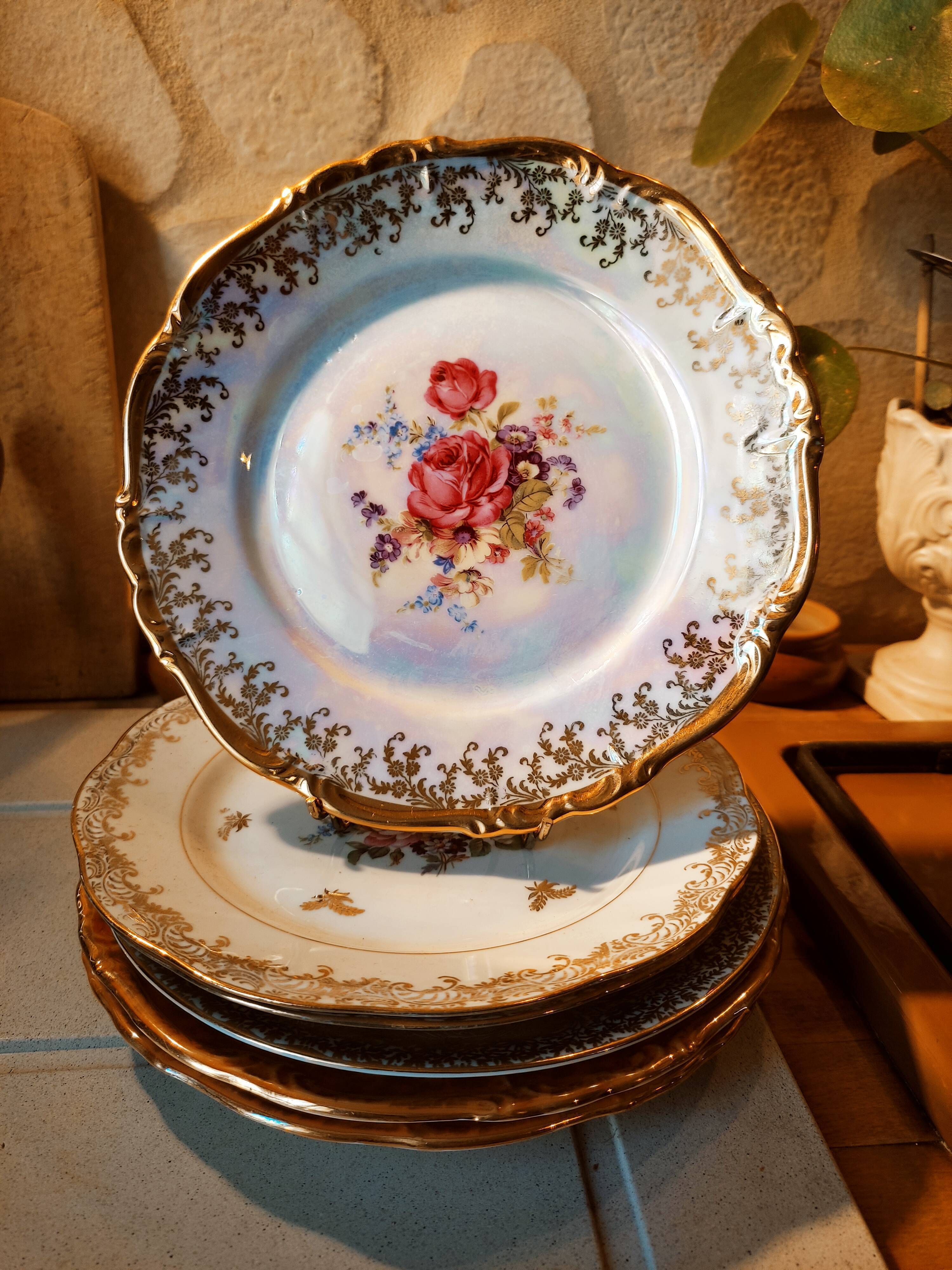 6 mismatched dessert plates decorated with roses