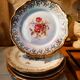 6 mismatched dessert plates decorated with roses