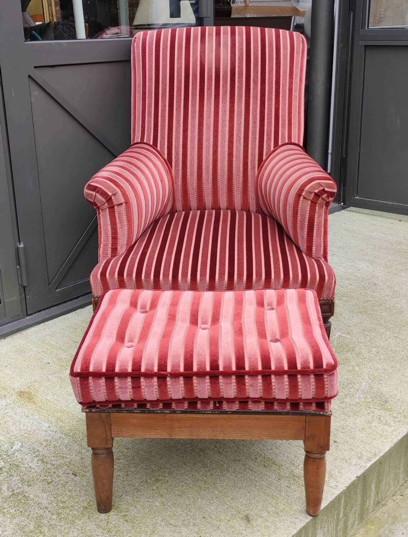 Old armchair and its Louis XVI style footrest/velvet covering