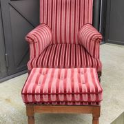 Old armchair and its Louis XVI style footrest/velvet covering