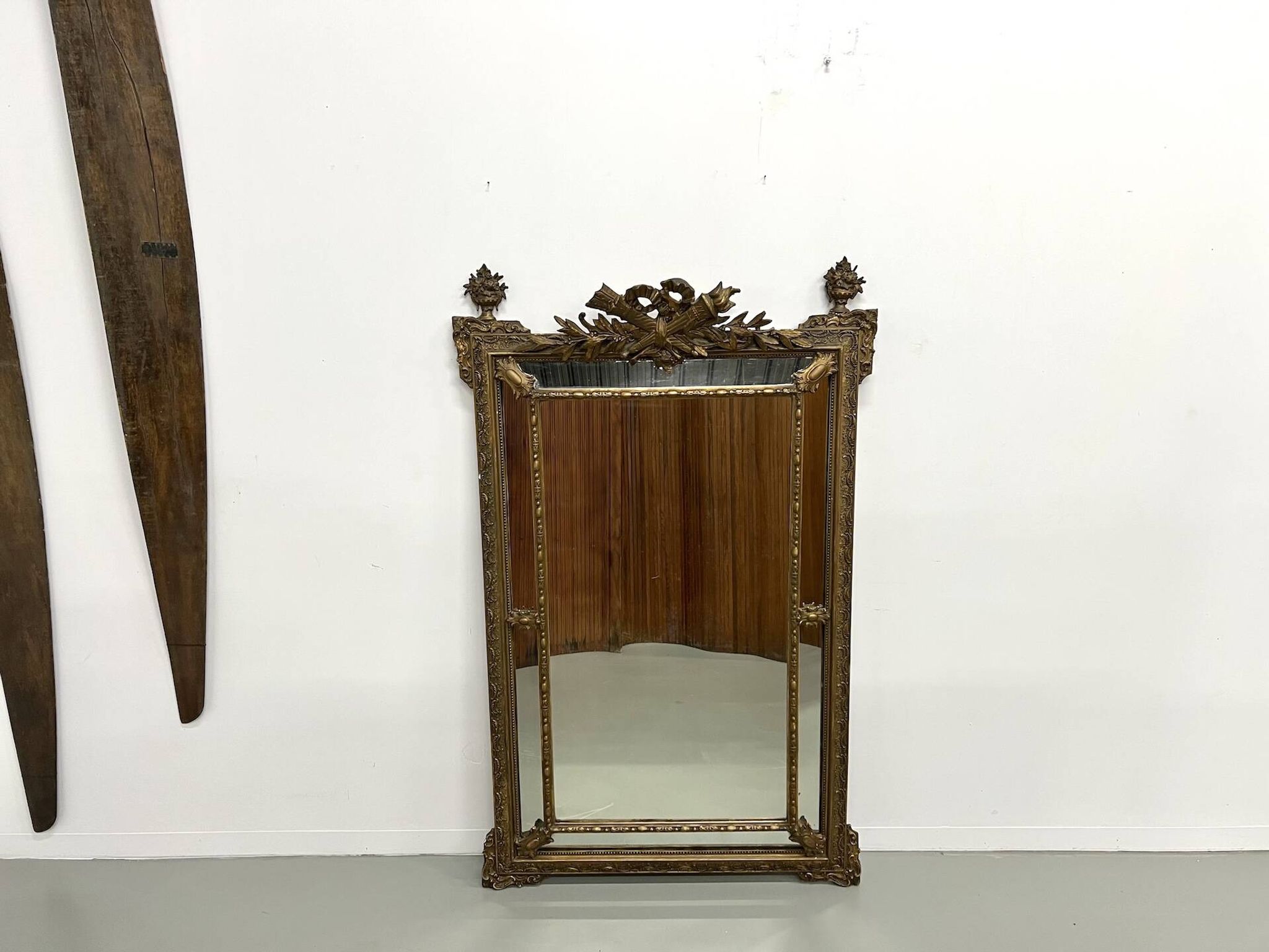 Large antique pediment mirror with mouldings.