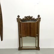 Large antique pediment mirror with mouldings.