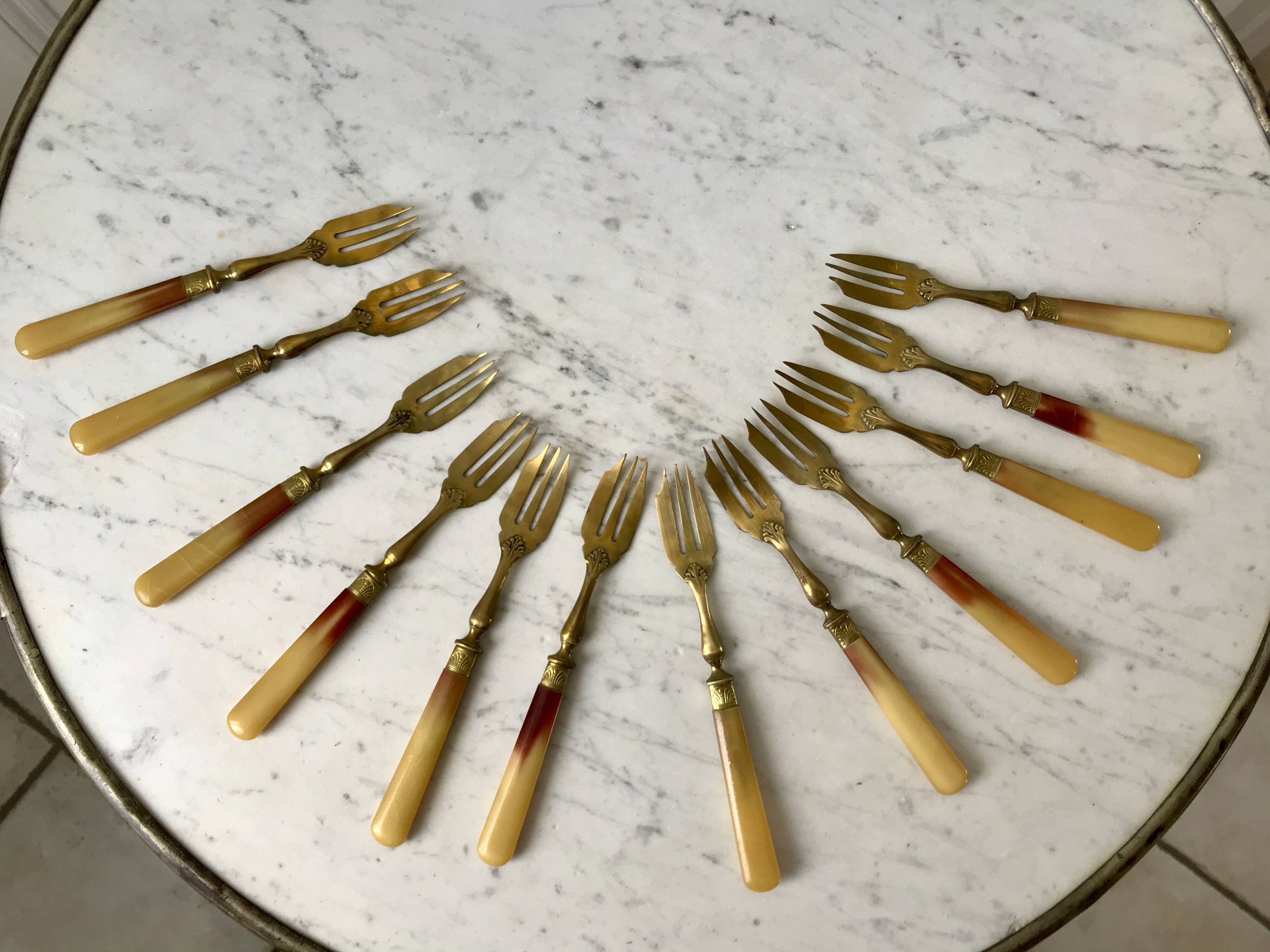 set of 12 horn dessert forks from the 50s