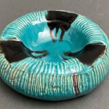 Twentieth century ceramic ashtray decorated with animals on a blue background