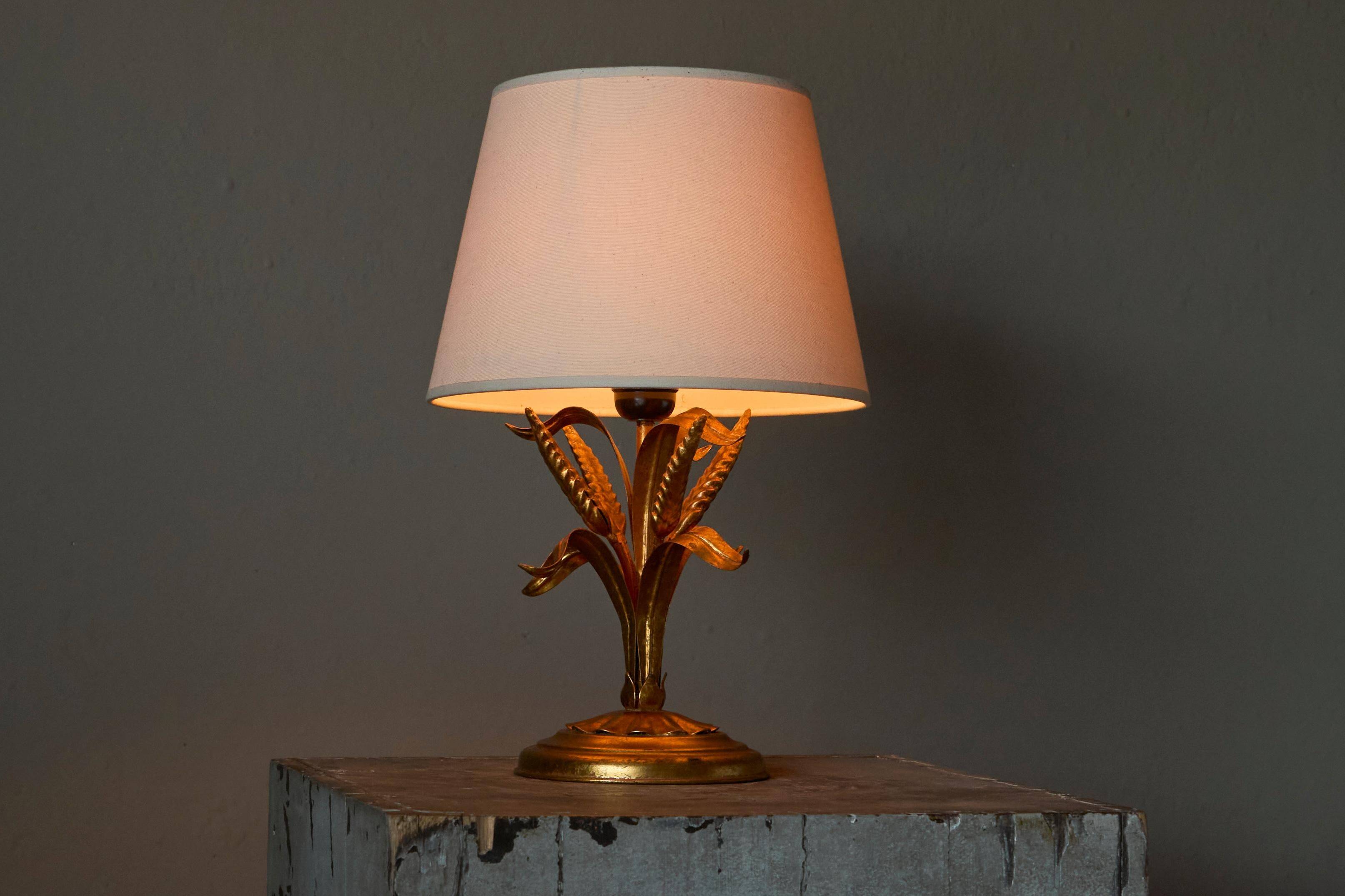 Gold metal table lamp with wheat pattern, mid-20th century.
