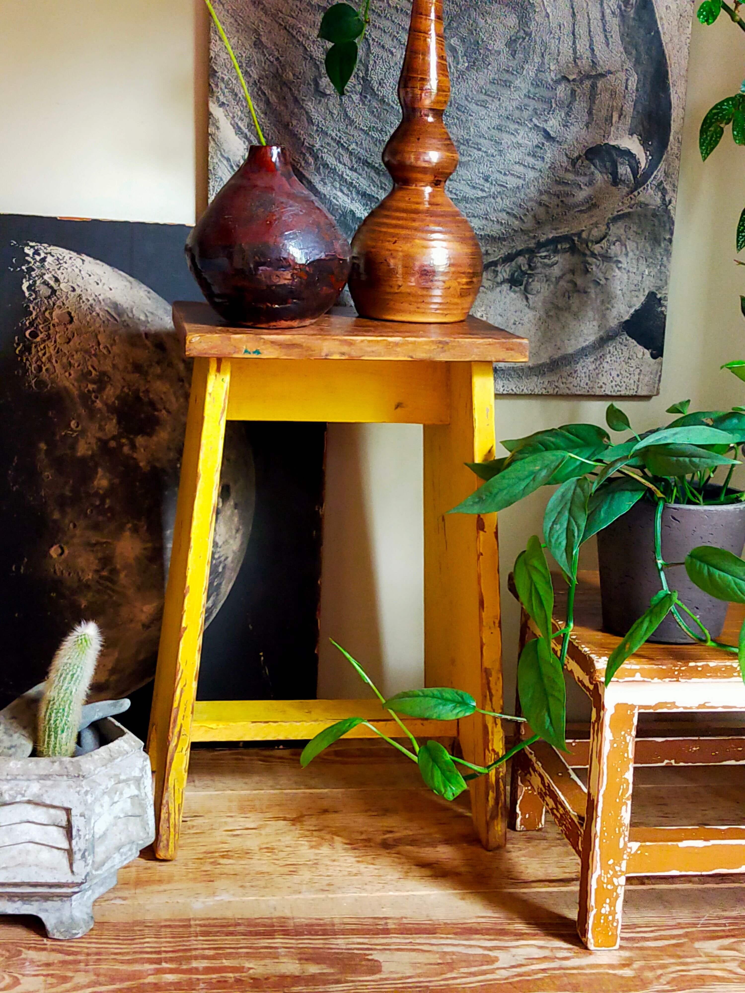 Art-populaire workshop stool in patinated wood