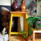 Art-populaire workshop stool in patinated wood