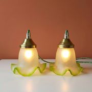 Duo of portable lamps in green tulip design.