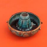 Empty pocke in glazed ceramic