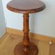 Round pedestal table in solid wood