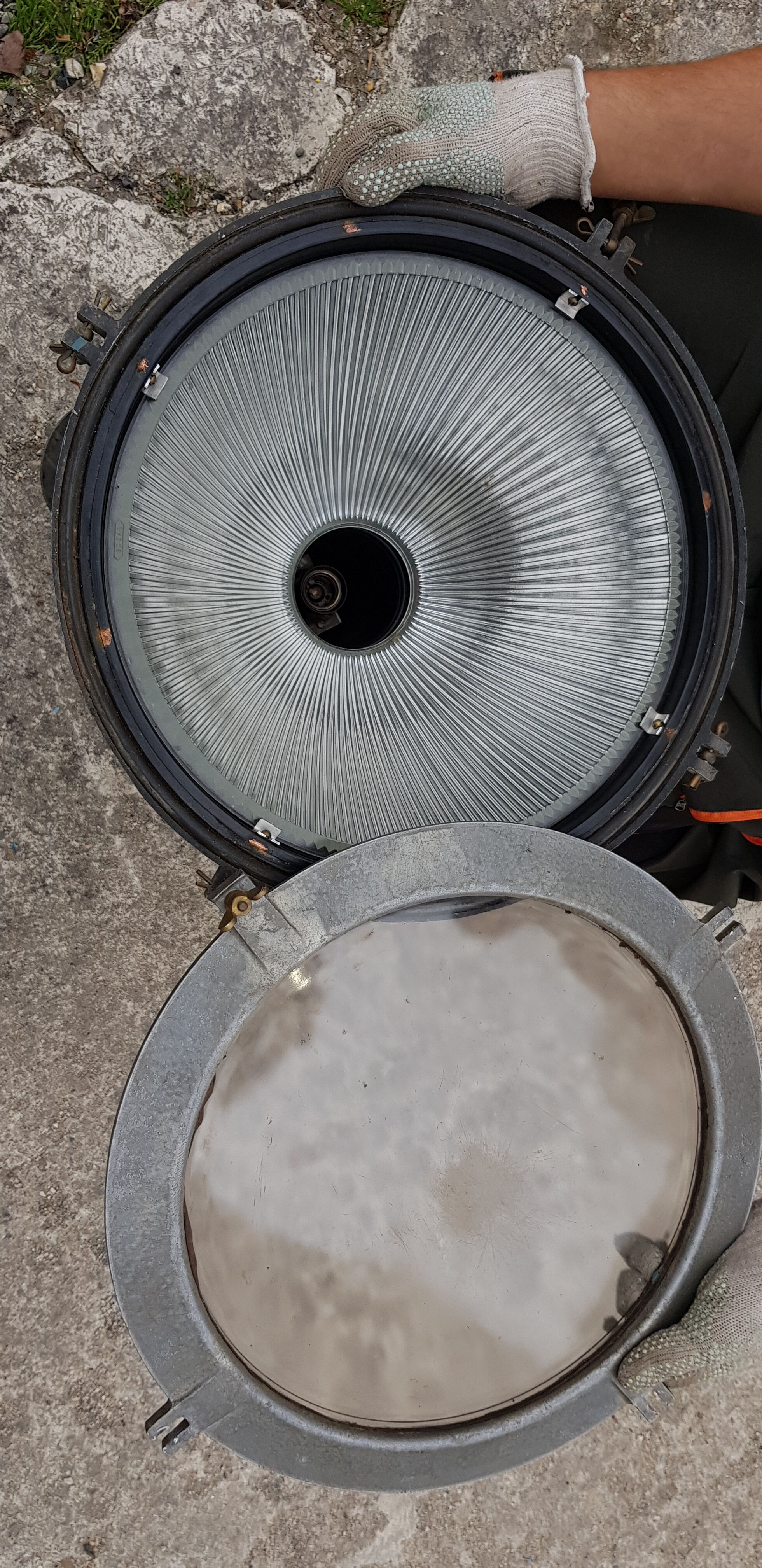 Old brass boat headlight with Holophane interior glass