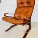 Vintage scandinavian cognac lounge chair by oddvin rykken 1960s