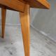 Dining table in blond oak compass feet 1950