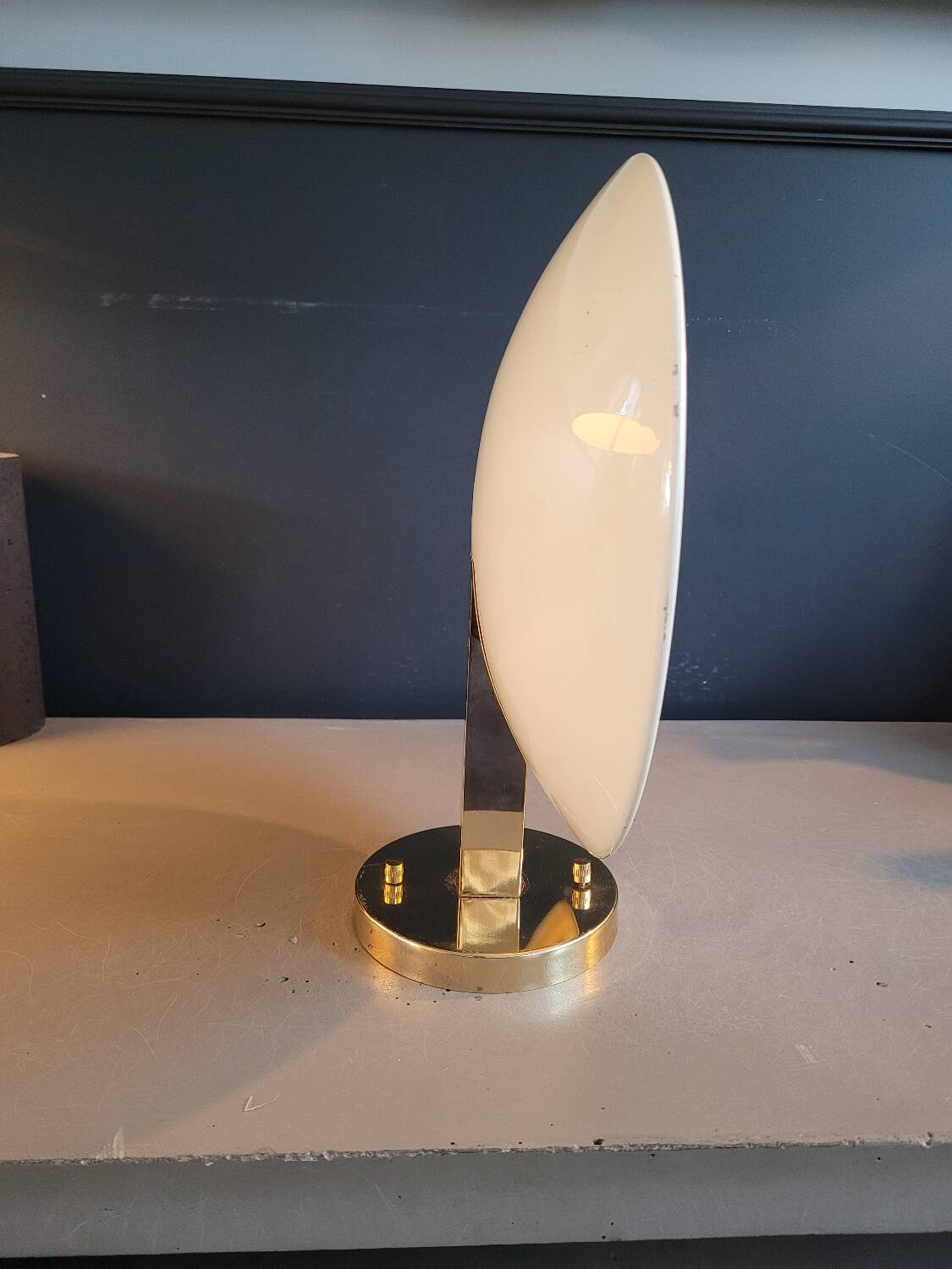 Gold and cream white saucer wall sconce