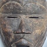 Dan mask in carved wood, brown patina, Ivory Coast, 25 cm