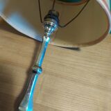 Silver metal lamp with its lampshade