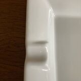 White porcelain ashtray empty pocket