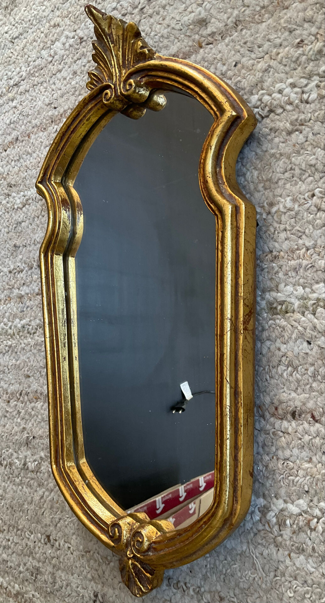 Vintage gilded wood Rococo mirror from the 1970s.