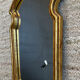 Vintage gilded wood Rococo mirror from the 1970s.