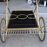 Rolling cart in brass and smoked glass