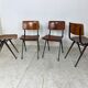 Ensemble de 4 chaises industrielles du milieu du siècle de Marko