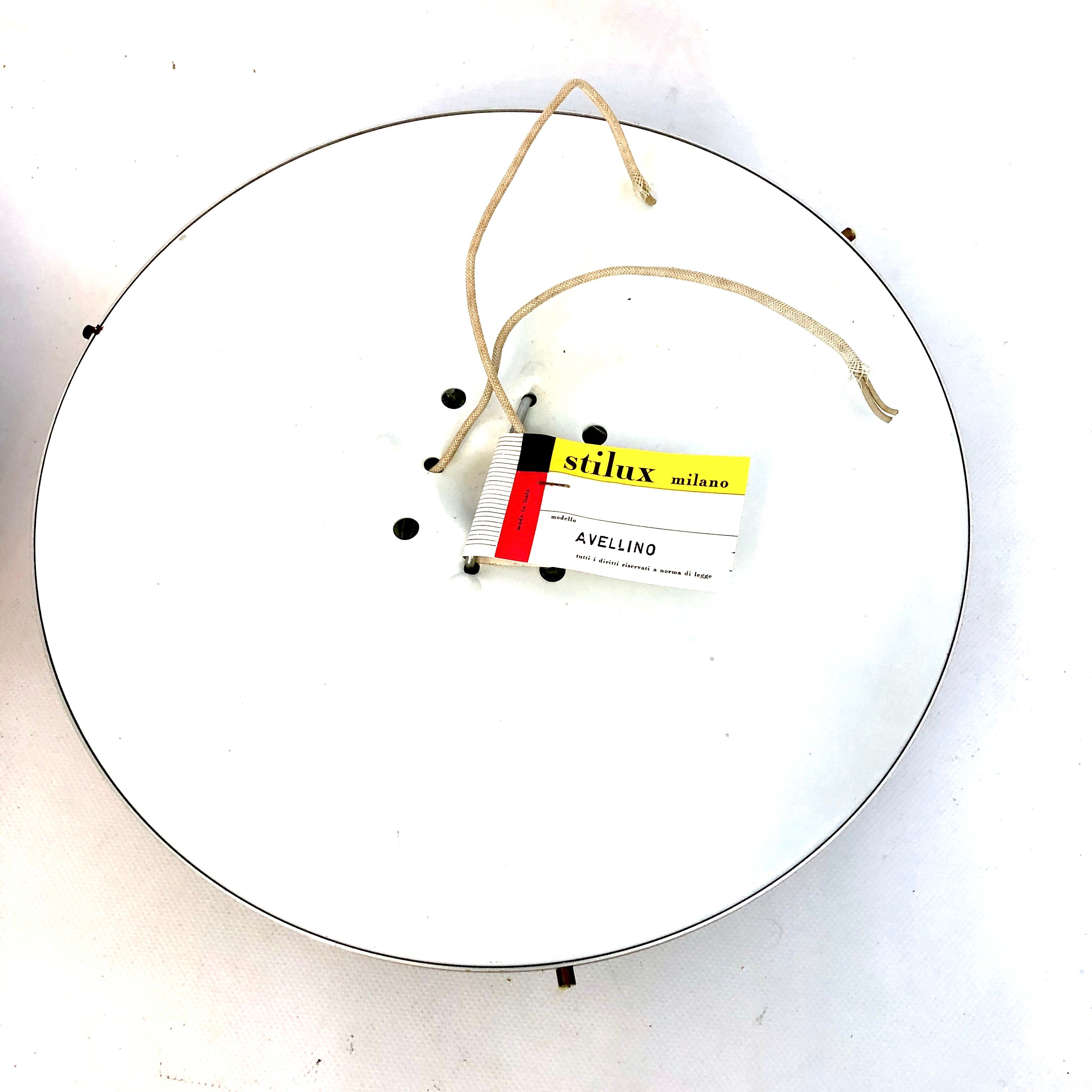 Stilux Milano, Mid-Century gild and glass ceiling lamps or sconces. Set of two