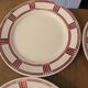 Eight Badonviller dinner plates