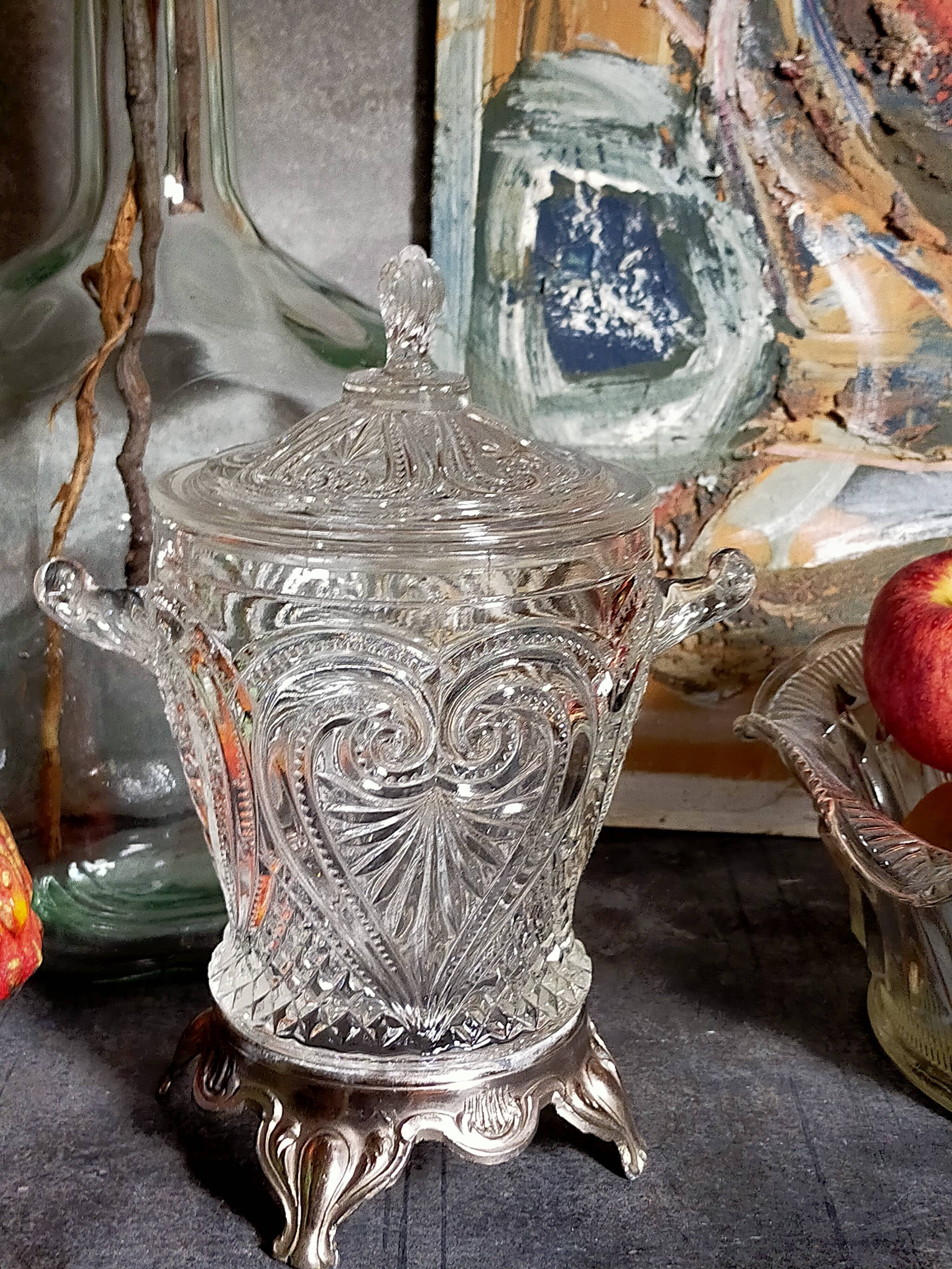 Antique glass compotier on metal stand