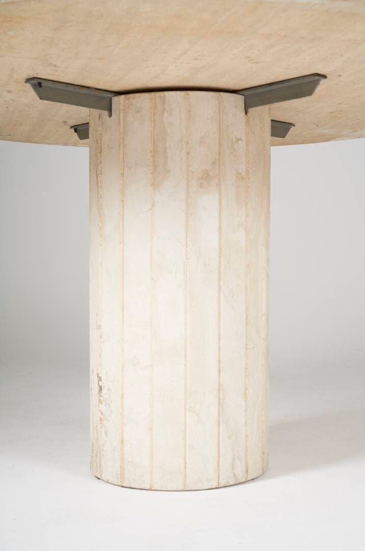 Round travertine dining table