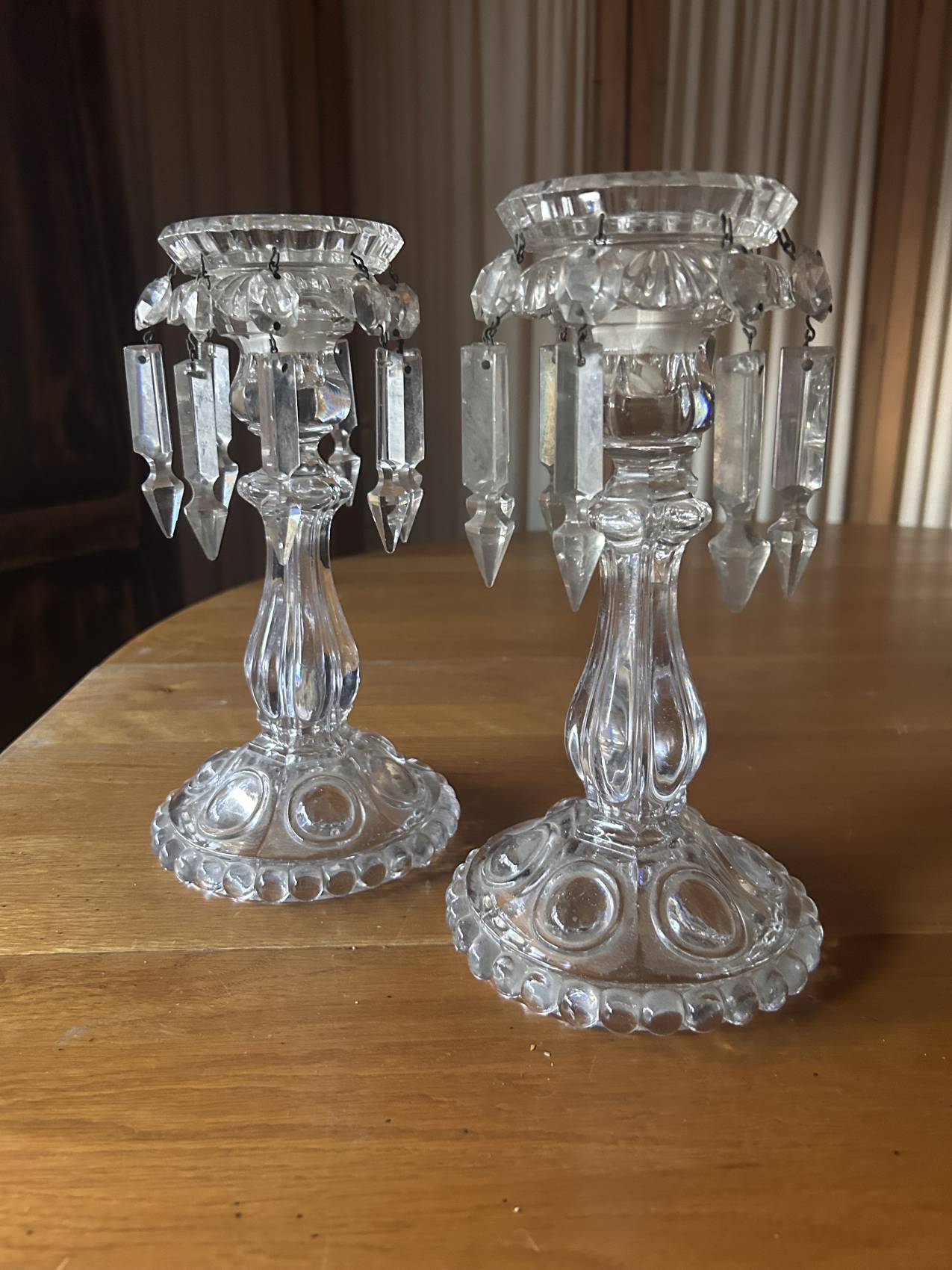 Pair of large Baccarat crystal candlesticks with pendants, a rare choice.