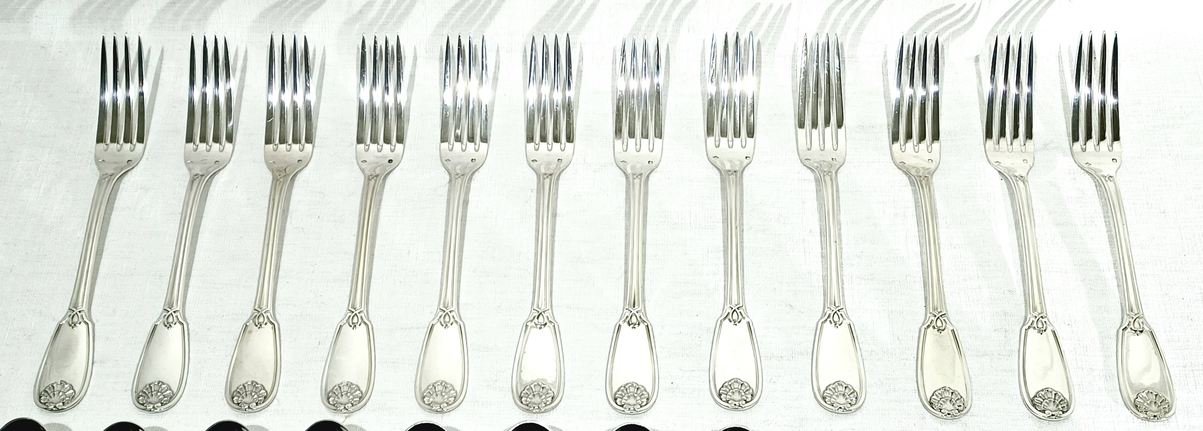 12 Louis XIV style silver cutlery sets
