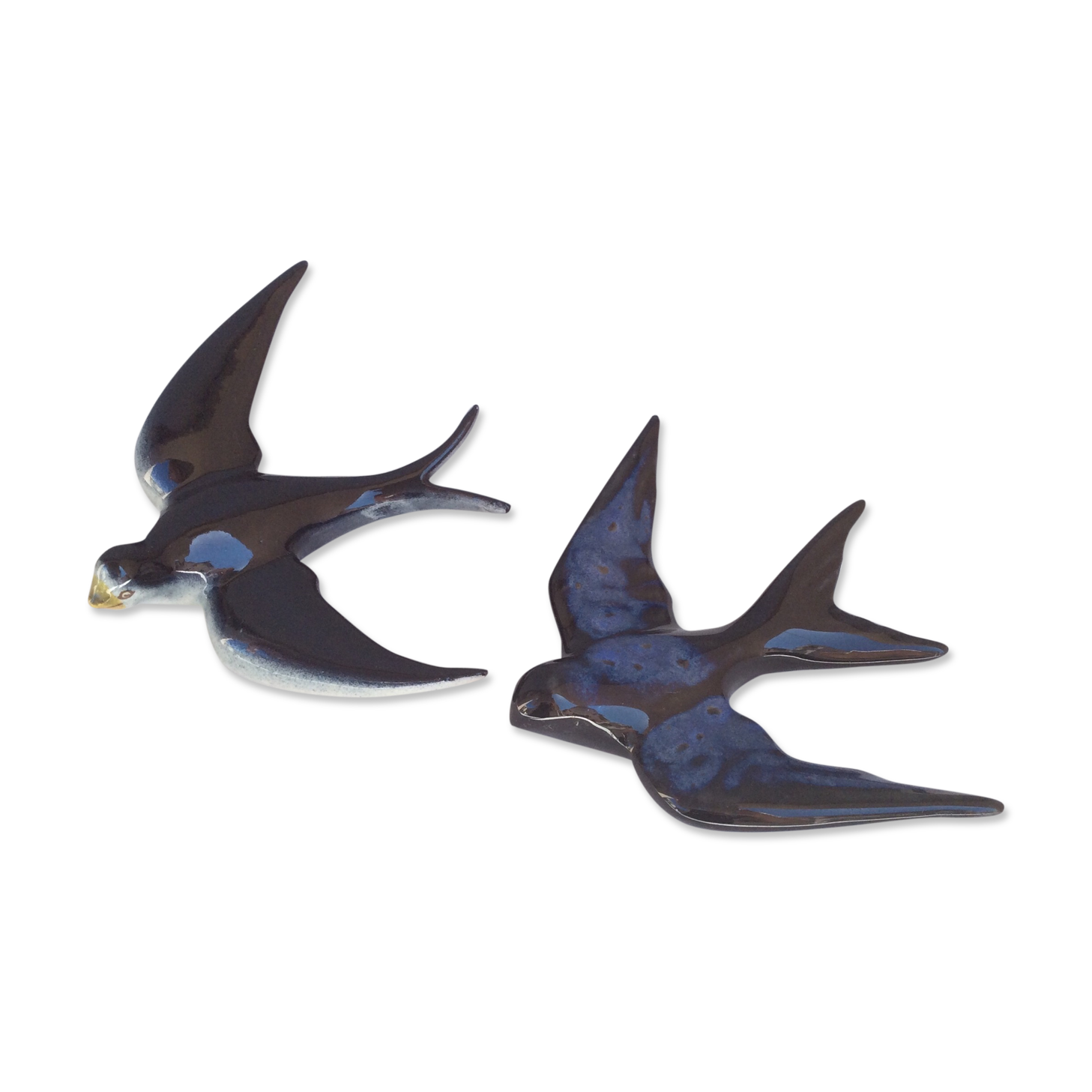 Two ceramic wall swallows