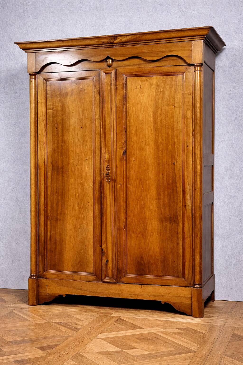 Empire period wardrobe, made of solid walnut, dating from the early 19th century.