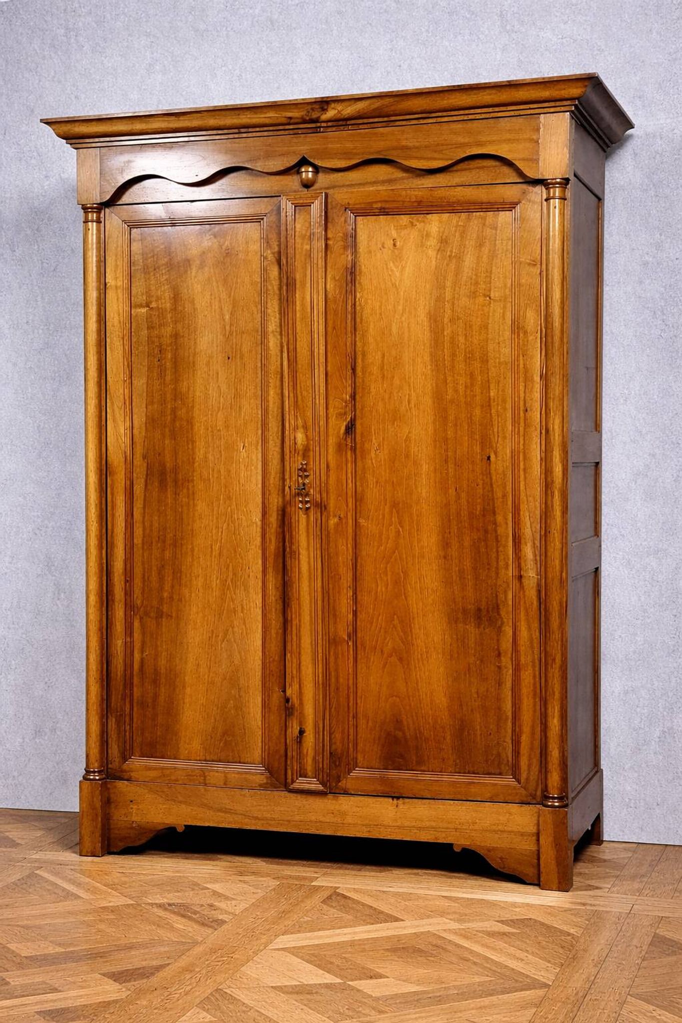 Empire period wardrobe, made of solid walnut, dating from the early 19th century.