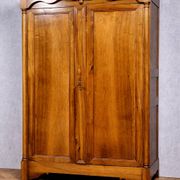 Empire period wardrobe, made of solid walnut, dating from the early 19th century.