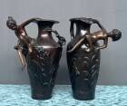 Pair of Art Nouveau vases in solid bronze.