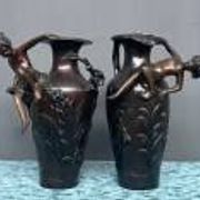 Pair of Art Nouveau vases in solid bronze.