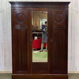 19th-century English mahogany three-door wardrobe.