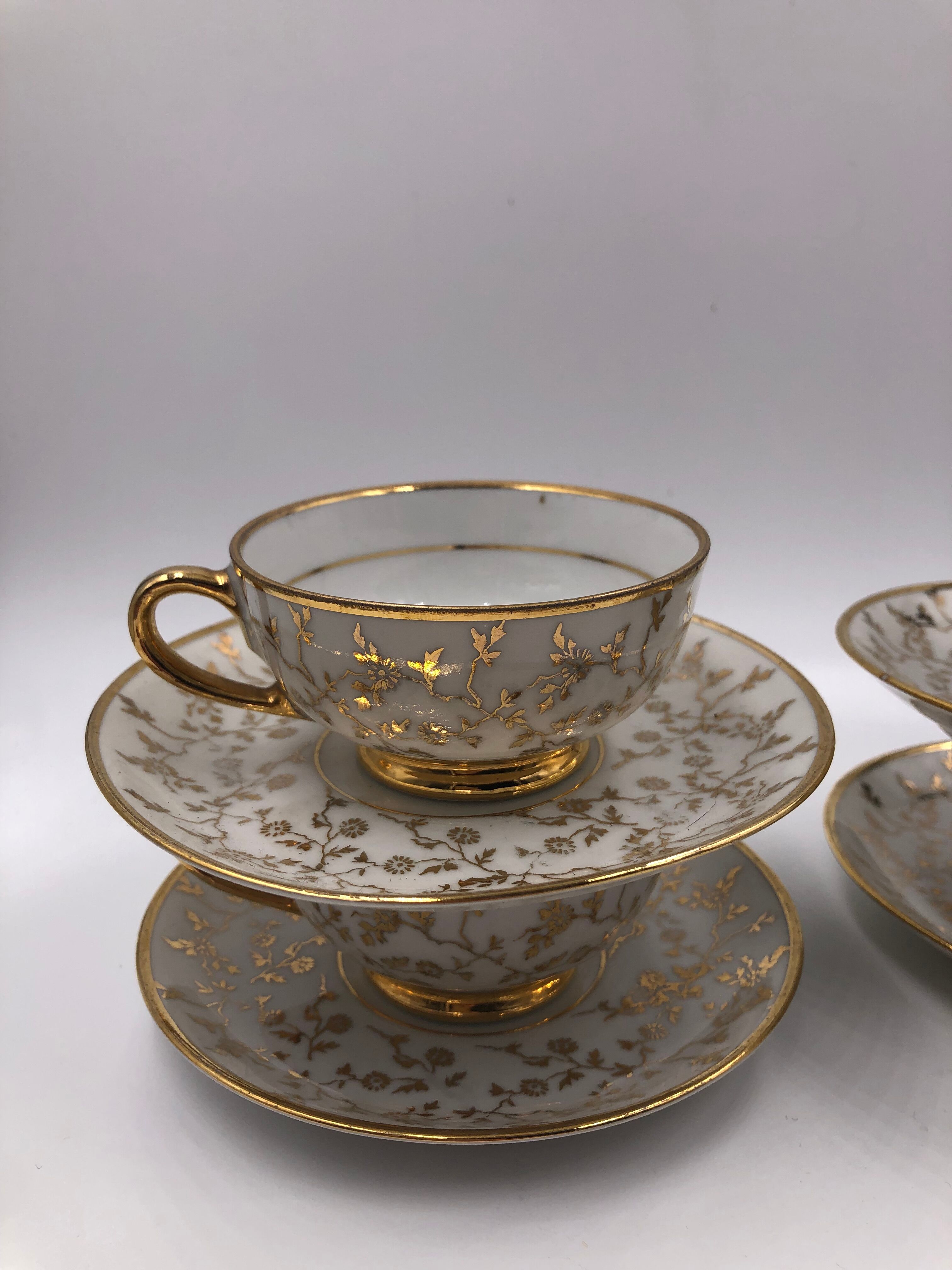 Serving together 4 cups and under cups coffee/tea flowers porcelain golden Vintage