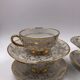 Serving together 4 cups and under cups coffee/tea flowers porcelain golden Vintage