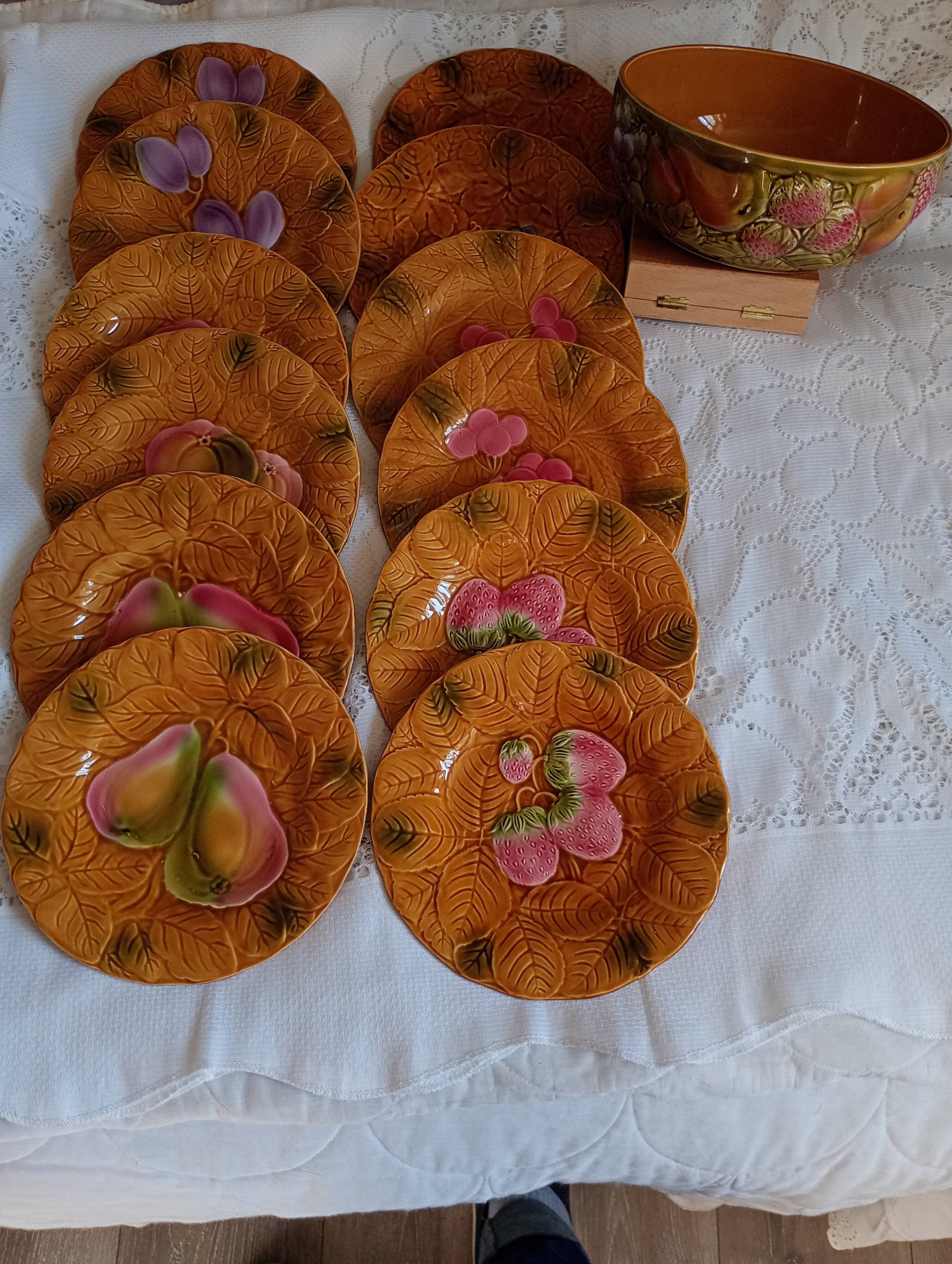 12 dessert plates and deep dishes from Salins-les-Bains, France.