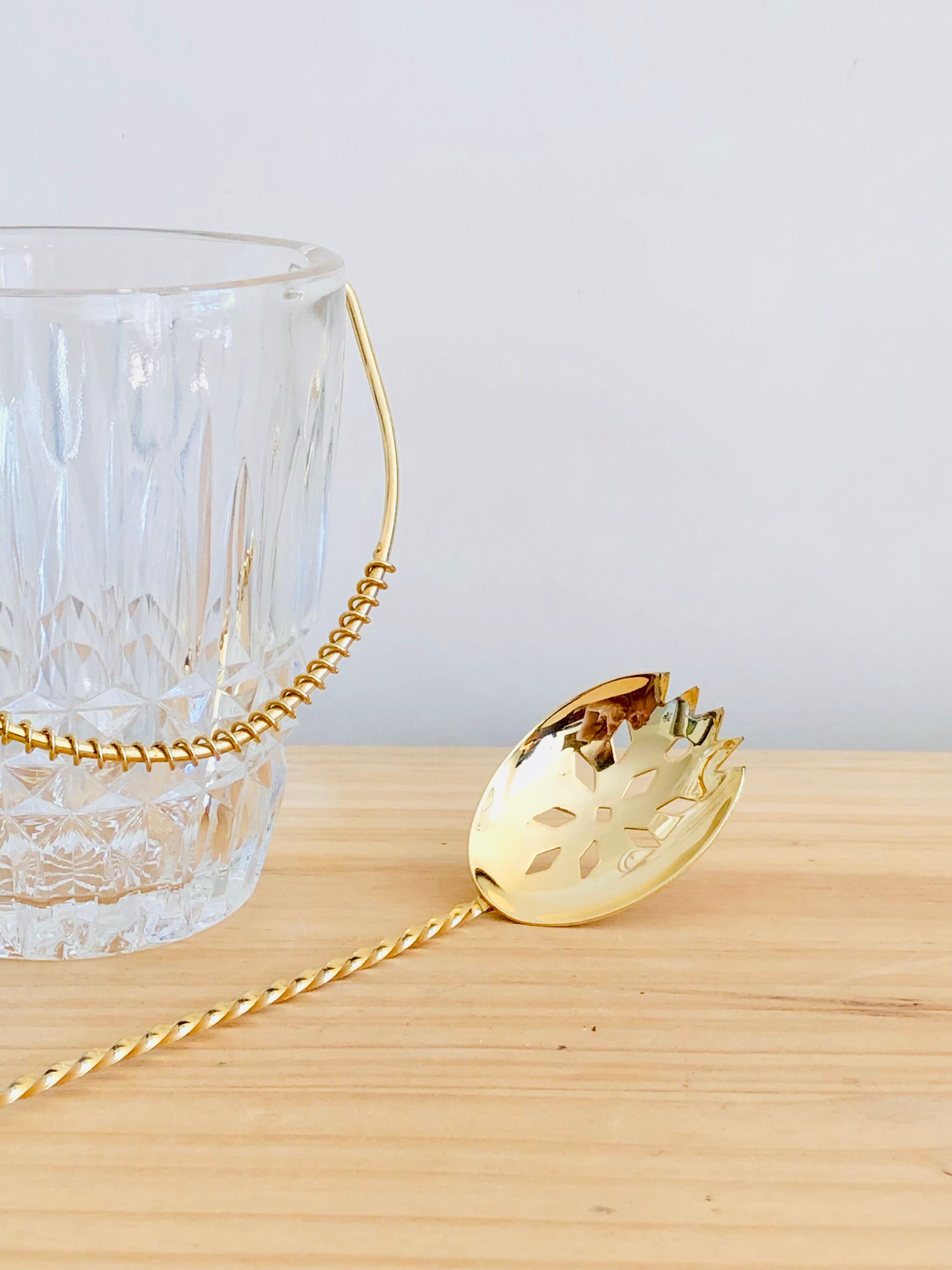 Crystal ice bucket and spoon thereof